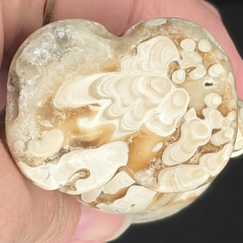 235 g a teddy bear figurine, made from stone jasper or a similar agate material.